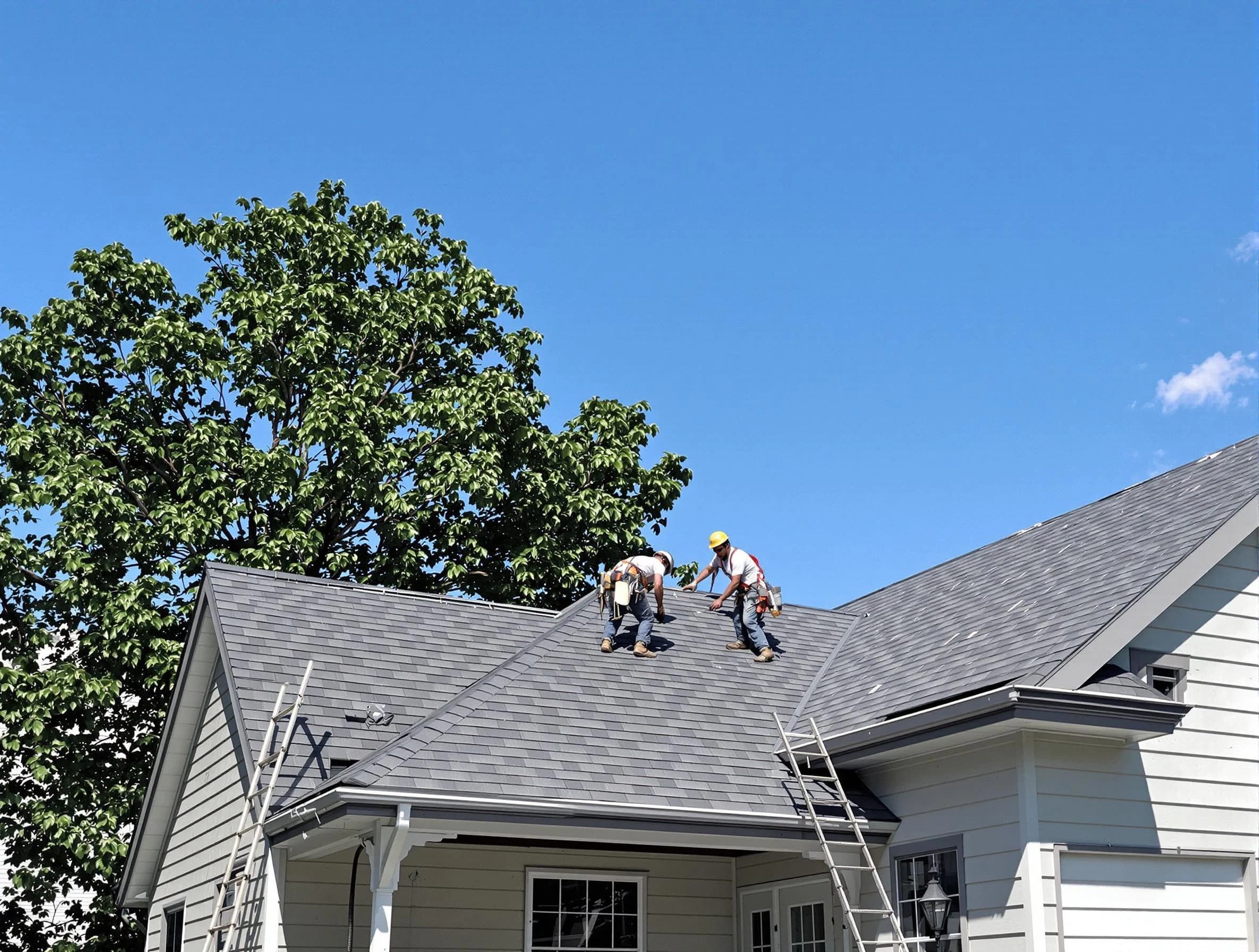 Kent Roofing Company crew finalizing a roof installation in Kent, OH