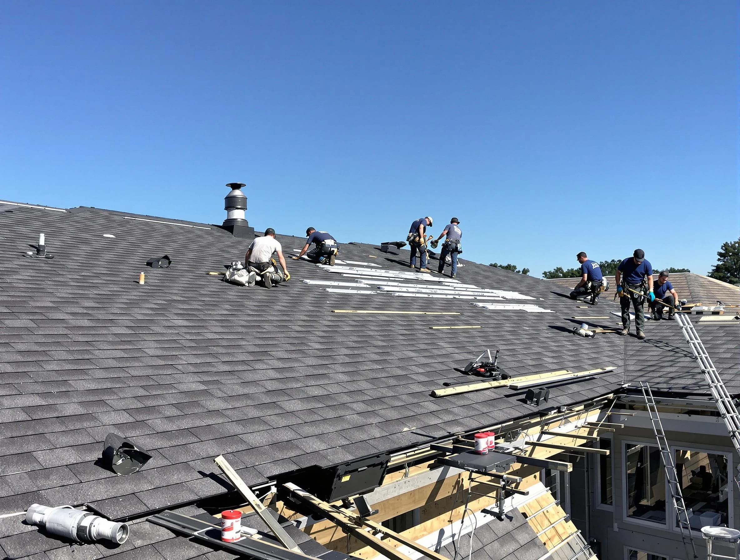 Kent Roofing Company experts performing roof installation in Kent, OH