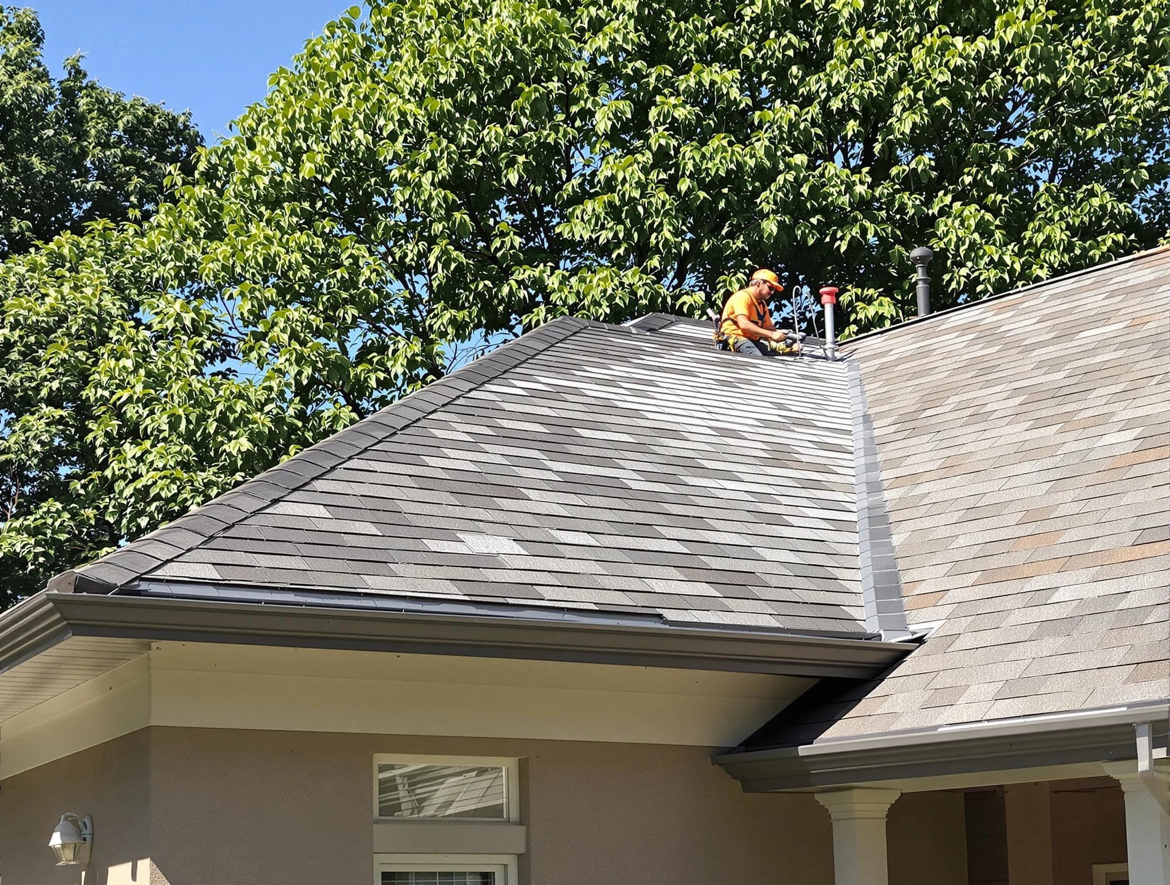 Newly completed shingle roofing by Kent Roofing Company in Kent, OH